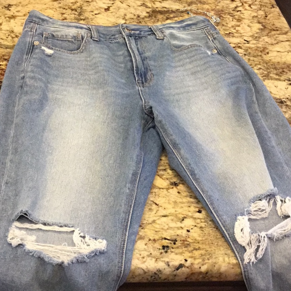 American Eagle Mom Jeans with rip details.
